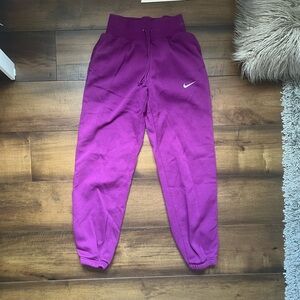 Purple Nike cuffed sweatpants